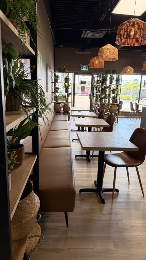 Wish Delish Cafe-Bistro interior with bench seating and pendant lighting