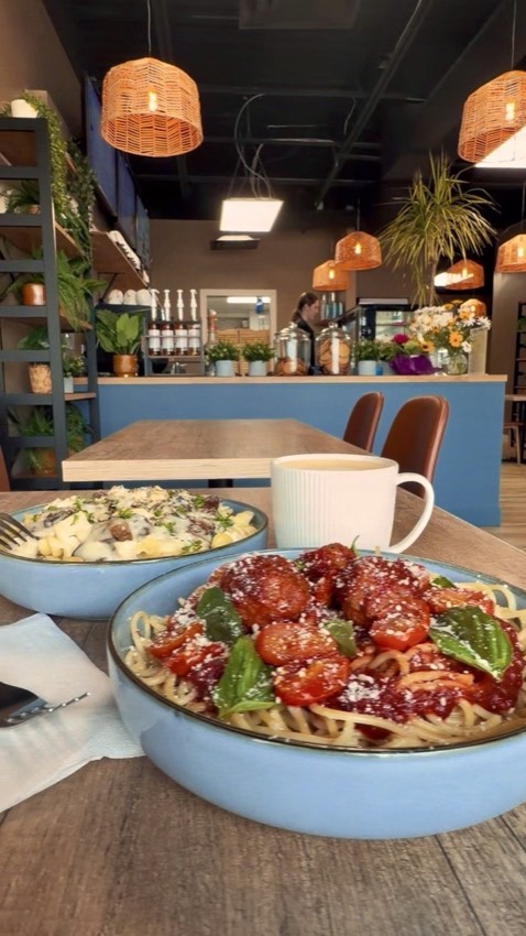 Wish Delish Cafe-Bistro dining area with creamy mushroom pasta and tomato meatball spaghetti bowls