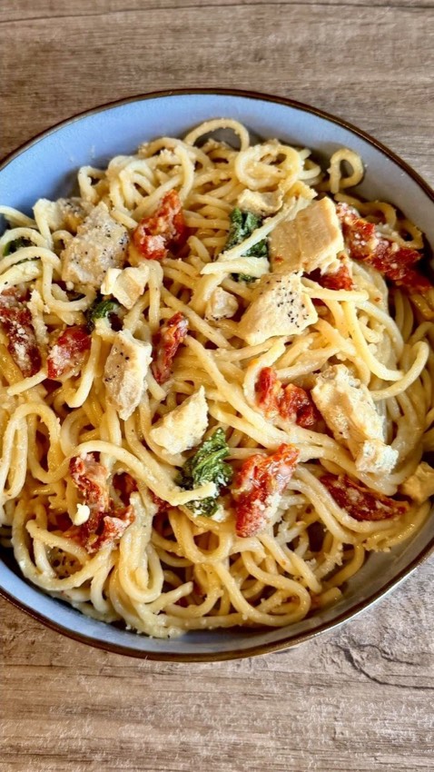 Creamy chicken pasta with sun-dried tomatoes, basil and parmesan at Wish Delish